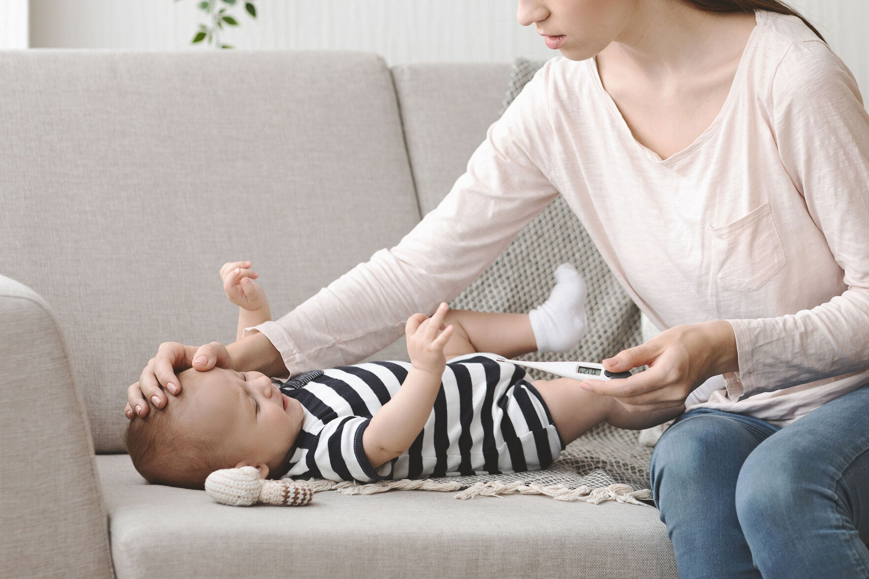 A common respiratory virus is spreading at unusually high levels, overwhelming children's hospitals. Here's what parents need to know